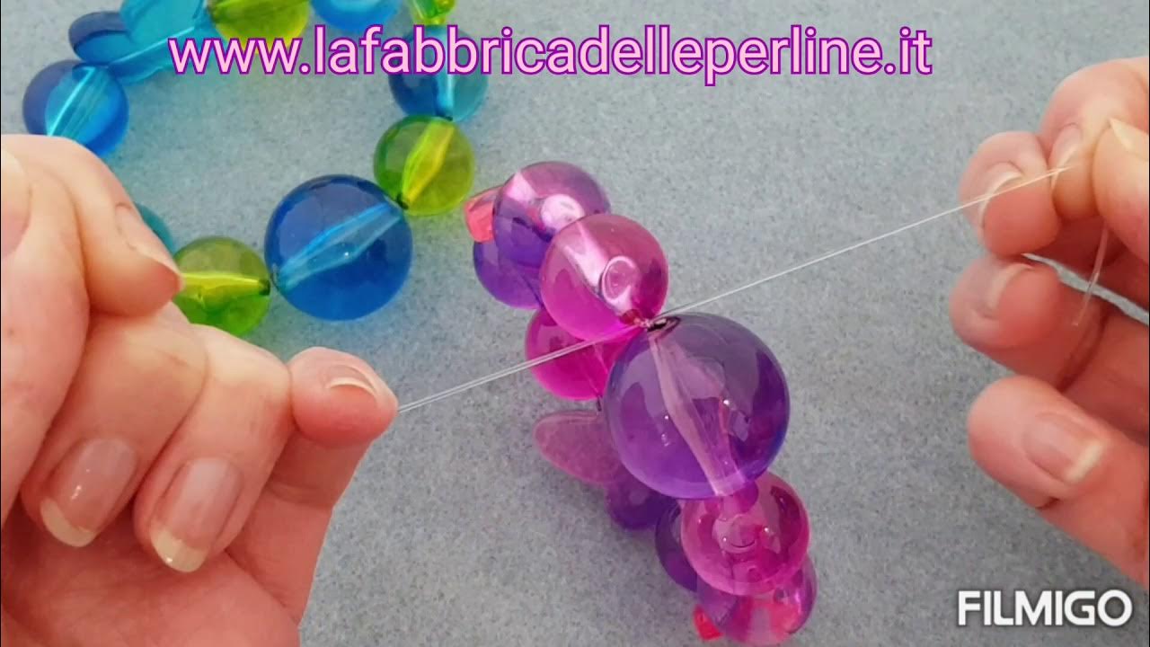 Come fare un nodo in un filo elastico per perline