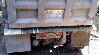 TOO FAST! TriAxel DumpTruck Tailgate Spread OVERSHOOTS on gravel driveway