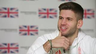 Gergely Siklosi gives advice to young fencers