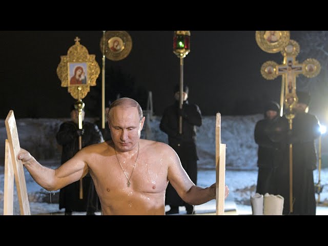 Russian president Vladimir Putin braves subzero lake to mark Orthodox Epiphany class=