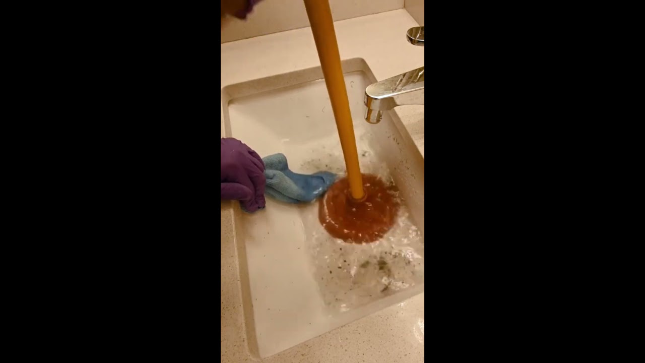 Unclogging A Bathroom Sink With Cheap Plunger