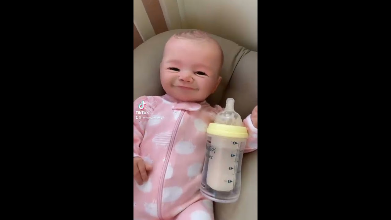 Lifelike Baby Doll Blinks And Smiles 