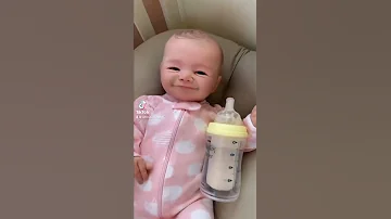 Lifelike Baby Doll Blinks And Smiles 