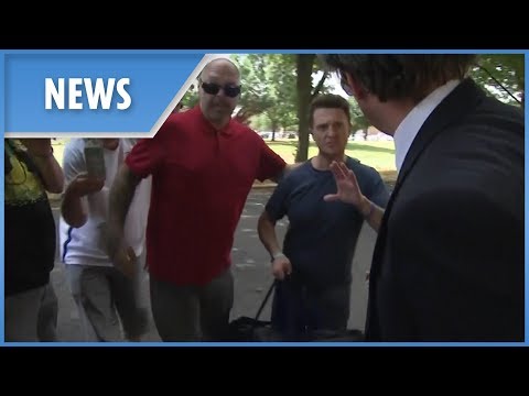 Tommy Robinson vs the press moments after his release