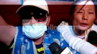 MALAYSIA: CHINESE MOTHER OVERCOME BY GRIEF