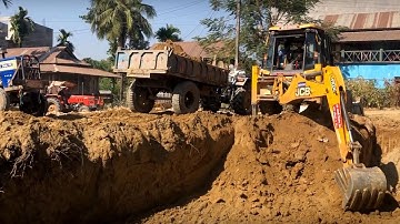 JCB Backhoe Loader Loading Soil On Tractors - JCB Making A Home Foundation