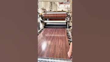 Wood veneer laminating process for PVC furniture board #machine #technology #plastic