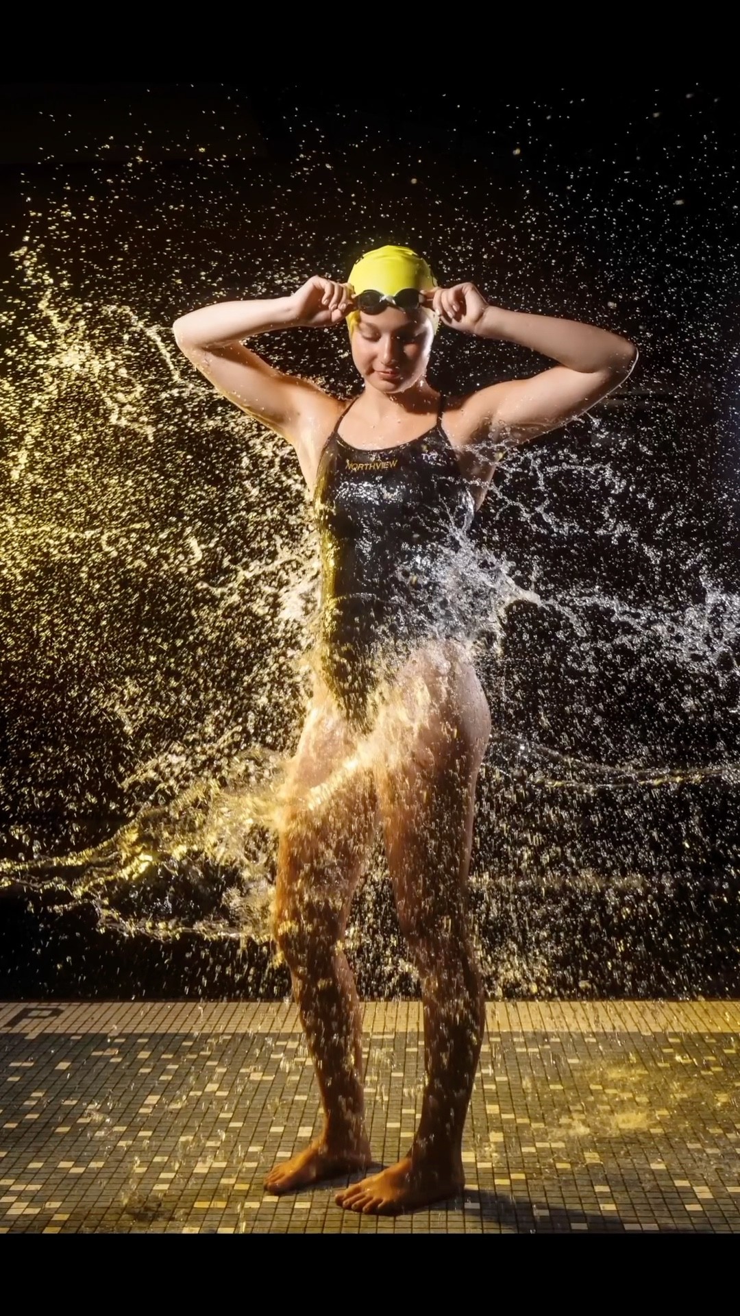 Creating an epic swim portrait! Just a splash of water for the right effect! #swimmer #photographer