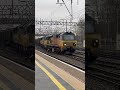 70810+70813 6Z66 Carlisle North Yard To Crewe TMD with three chirk log wagons