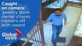 Jewelry store owner chases robbery suspects off with sword screenshot 4