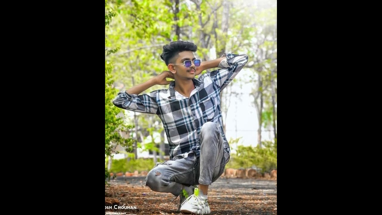 Handsome Boy Posing On The Camera On The Nature Background. Stock Photo,  Picture and Royalty Free Image. Image 88701267.