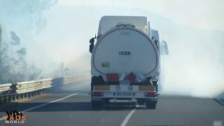 Dangerous situation -  TANK TRUCK DRIVER DECIDED  DRIVE THROUGH THE FIRE