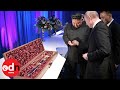 Kim Jong-un gives Vladimir Putin a SWORD at final summit dinner