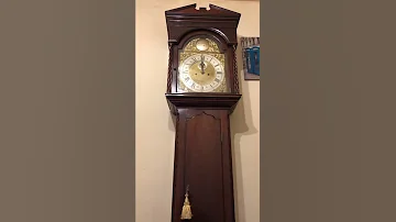 1700s Grandfather clock strikes 12 midnight.