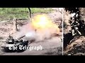 Russian troops flee as ukrainian tank fires on their position in bakhmut