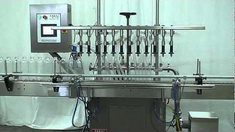 Pressure overflow liquid filler, filling Round PET Bottle, manufactured by Acasi Machinery