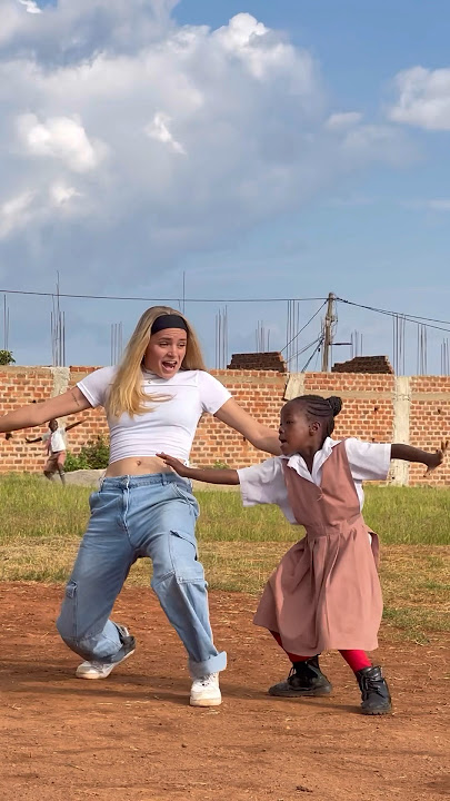 Did you spot the kid behind us??🤯😂 #uganda #wop #dance #trend #shorts #isabellafro