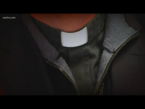 Priest arrested after recorded sex with two women on church altar in Louisiana, police say