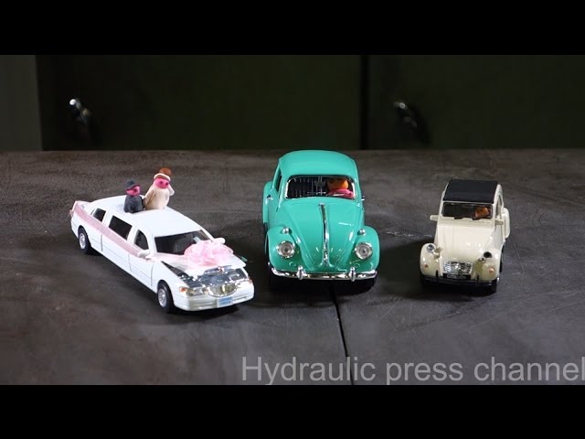 Crushing toy cars with hydraulic press 