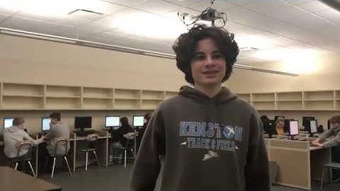 What has a tongue but cannot talk, and gets around a lot, but cannot walk?