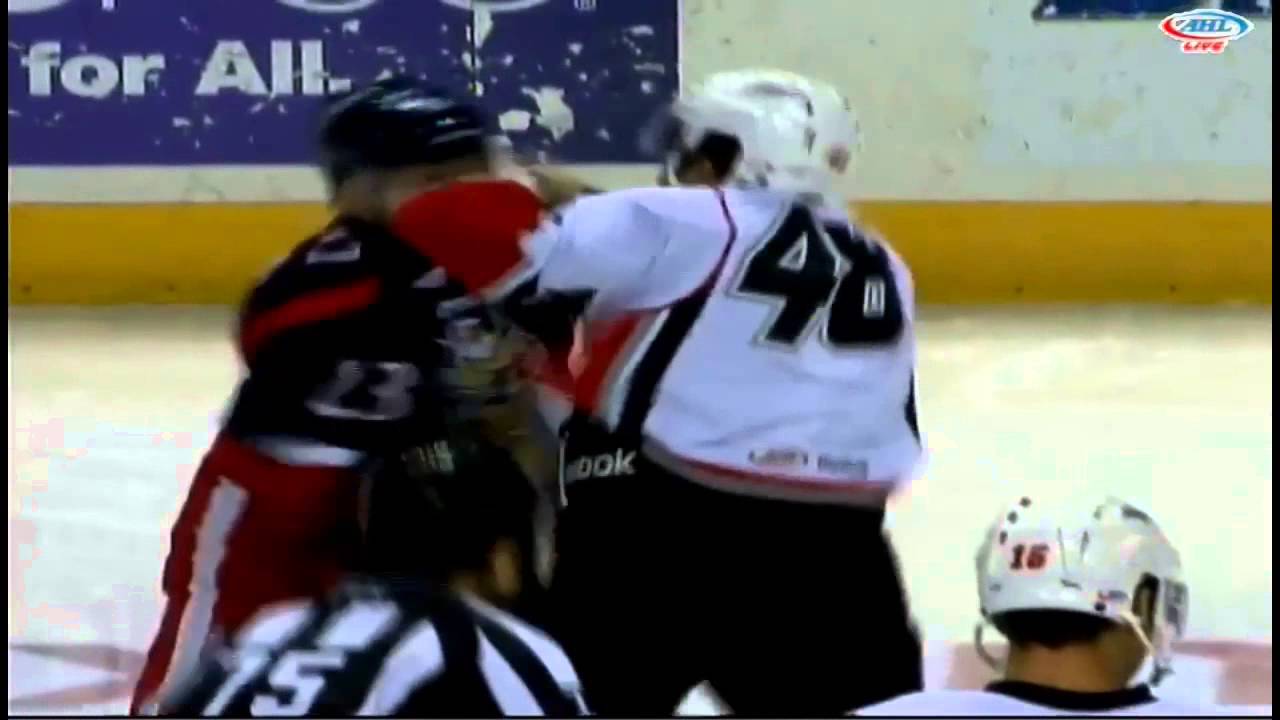 Triston Grant vs Brett Olson - Fight one second into the Game Feb 2 2013