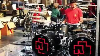 Rammstein drummer Christoph Schneider playing drums