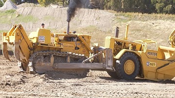Caterpillar D9G Pushing a Caterpillar 627 Motor Scraper