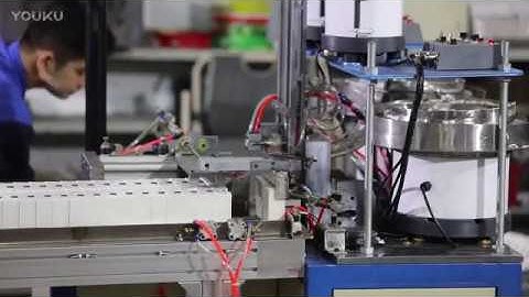 Automatic electrical outlet box assembly machine