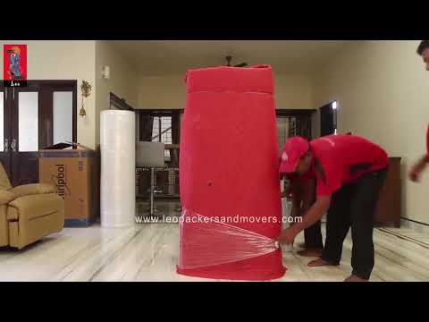 Packing and Unpacking of Fridge, Bike, Sofa, Utensils and Glass Table  | Leo Packers and Movers