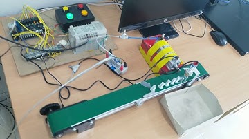 Automatic metal detector on convenyor by ladder PLC + Pnumetic