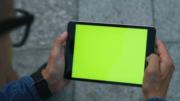 Green Screen | Chroma Key | Close up shot of attractive man using tablet with green screen | 4K | HD