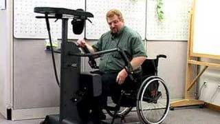 A paraplegic shows how to use a StrapStand standing device