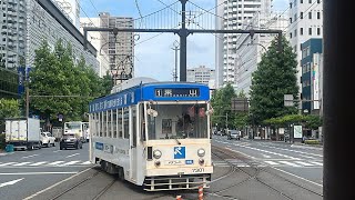 岡山電気軌道7300形メタコートラッピング　岡山駅前発車