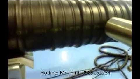 Máy in phun LINX   in code trên ống gân đen