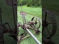 Cutting hay on the 100 acre mountain.