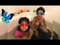 Kayhan and kyana swim in the bathtub