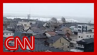 See massive waves after earthquake hits Japan image