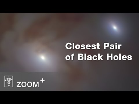Journey to the closest pair of supermassive black holes