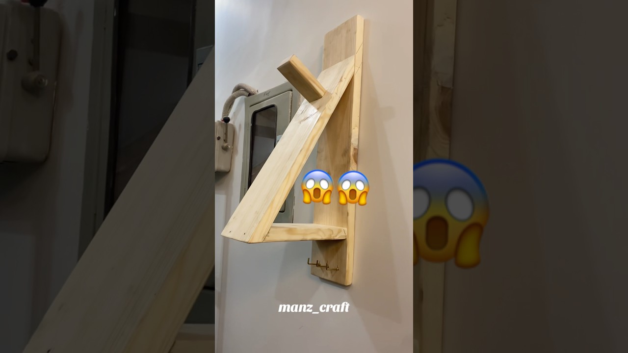 Wall mounted helmet hanger with key holder and storage design 