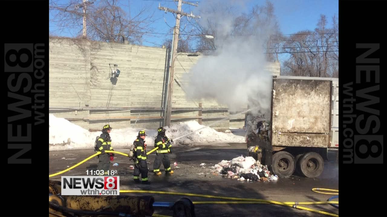 Garbage truck catches fire, three hydrants needed to put it out - YouTube