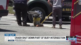 Rollover crash closes busy Greenville intersection