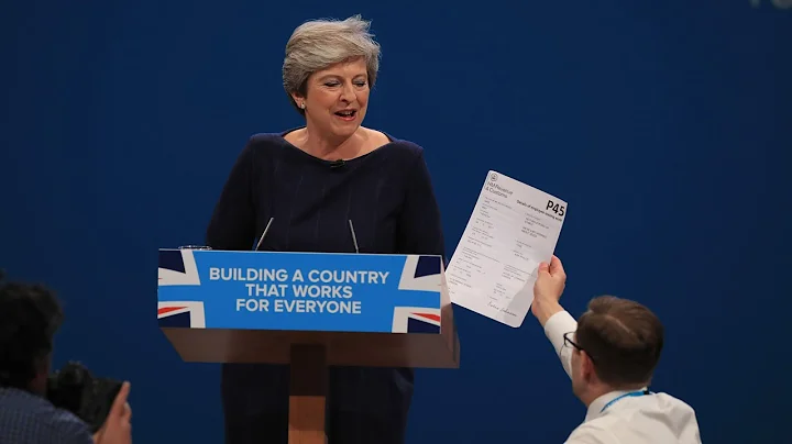 Prankster interrupts Theresa May's conference spee...