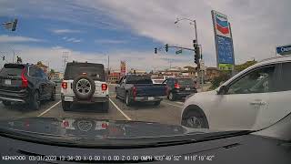 Road Rage Toyota Driver Throws Object At Vehicle Then Runs A Red Light To Escape Retaliation.