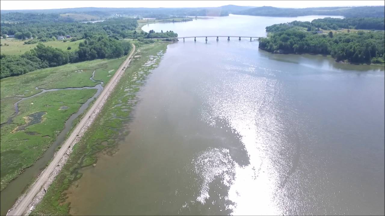 Drone Fly toward bridge on Rim Road 92 Machias River in Downeast Maine