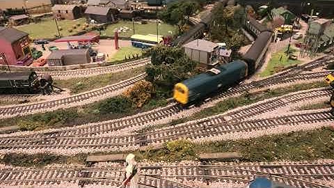 Class 47 and class 71 pulling trains on our model railway.