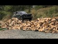 The suv 4x4 rides on logs