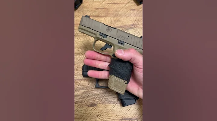 FN Reflex or Glock 26?