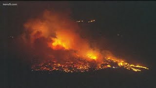 Large flames seen burning Saturday night from Camp Bullis fire