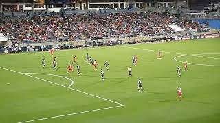 Paul Izzo of Australia dives to stop Ismaël Koné of Canada in FIFA friendly 10/10/25
