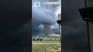 TWISTER! Canadian Man Captures MASSIVE Funnel Cloud Footage